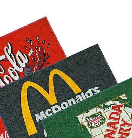 Professional branded fibre mat with custom logo design for entrances