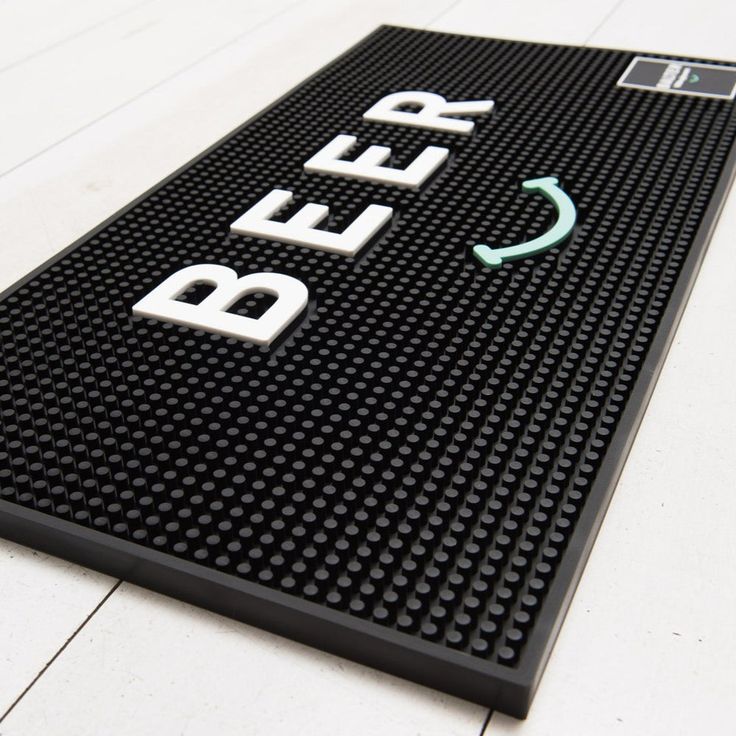 Black slim bar mat for home bar and pub shed with BEER text and smiley design