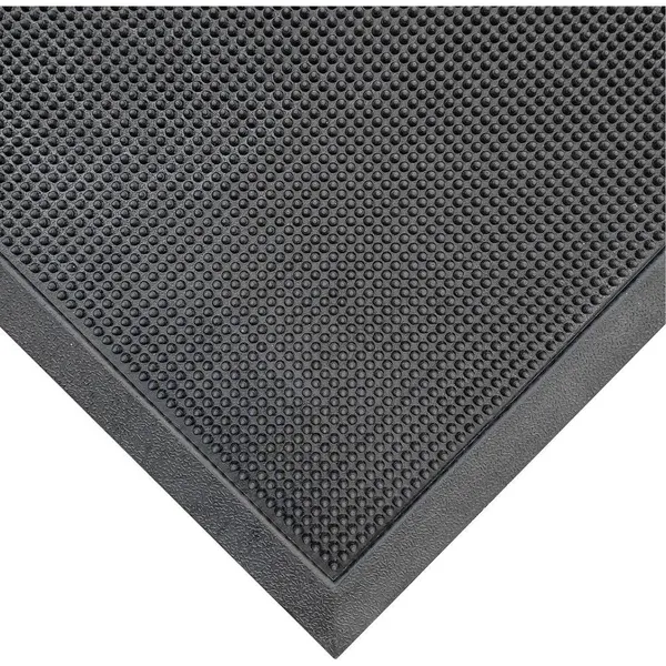 Black workstation anti-fatigue mat with textured non-slip surface and beveled edge